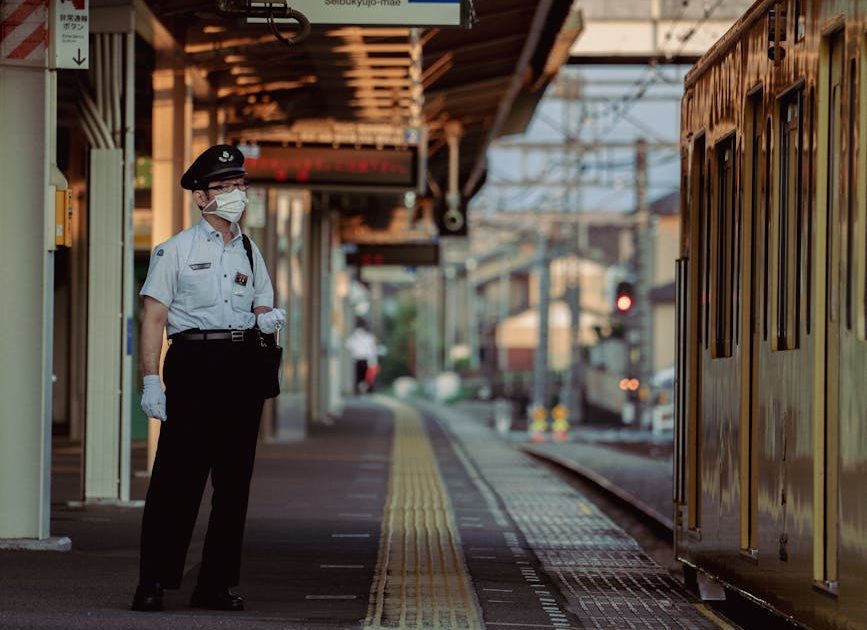 man working at railway station